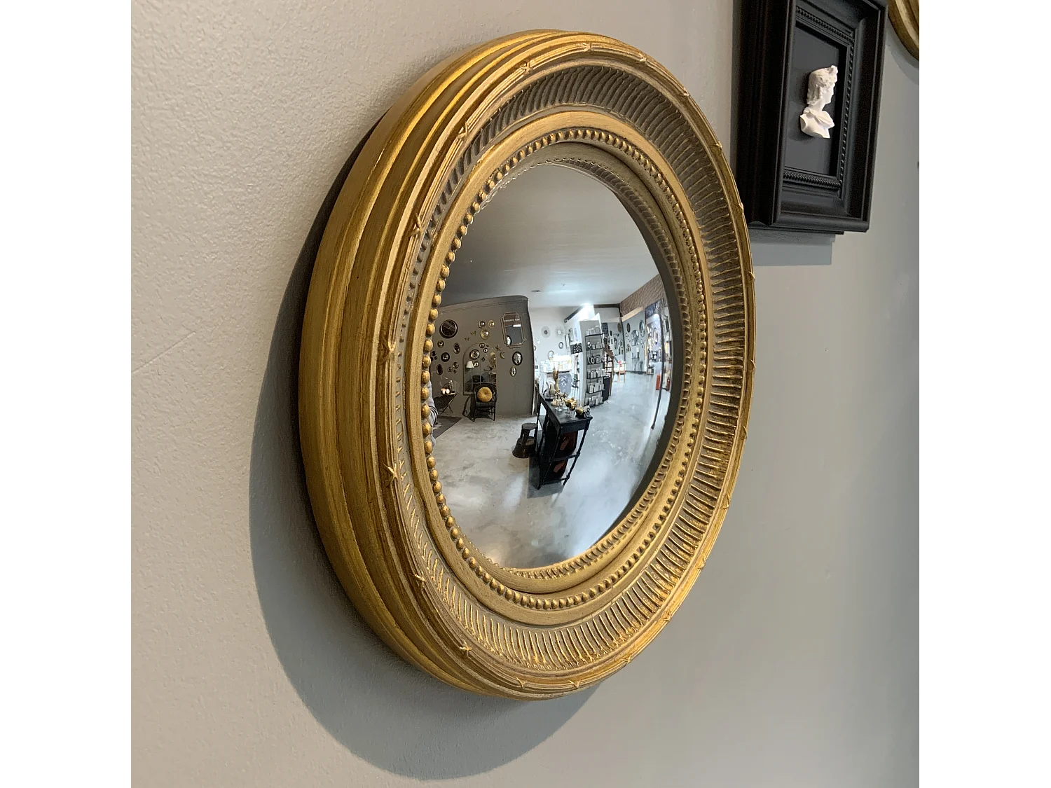 Miroir convexe doré 28cm int et 38cm ext