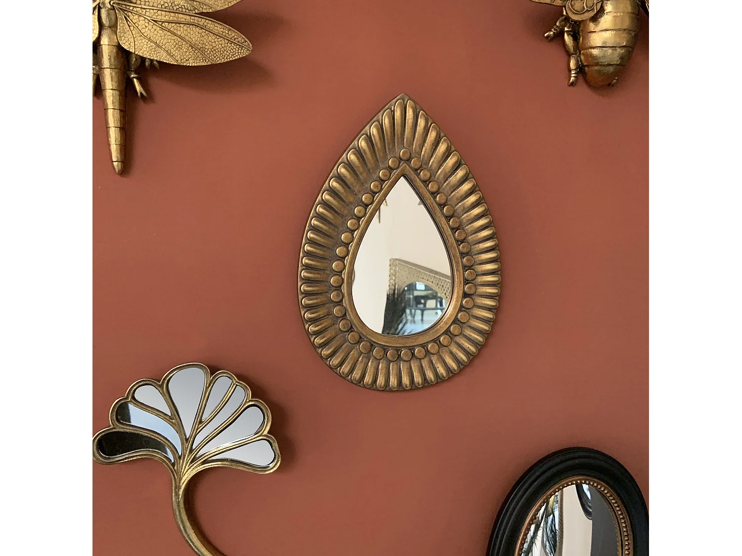 Miroir goutte doré motifs 19,7x27cm