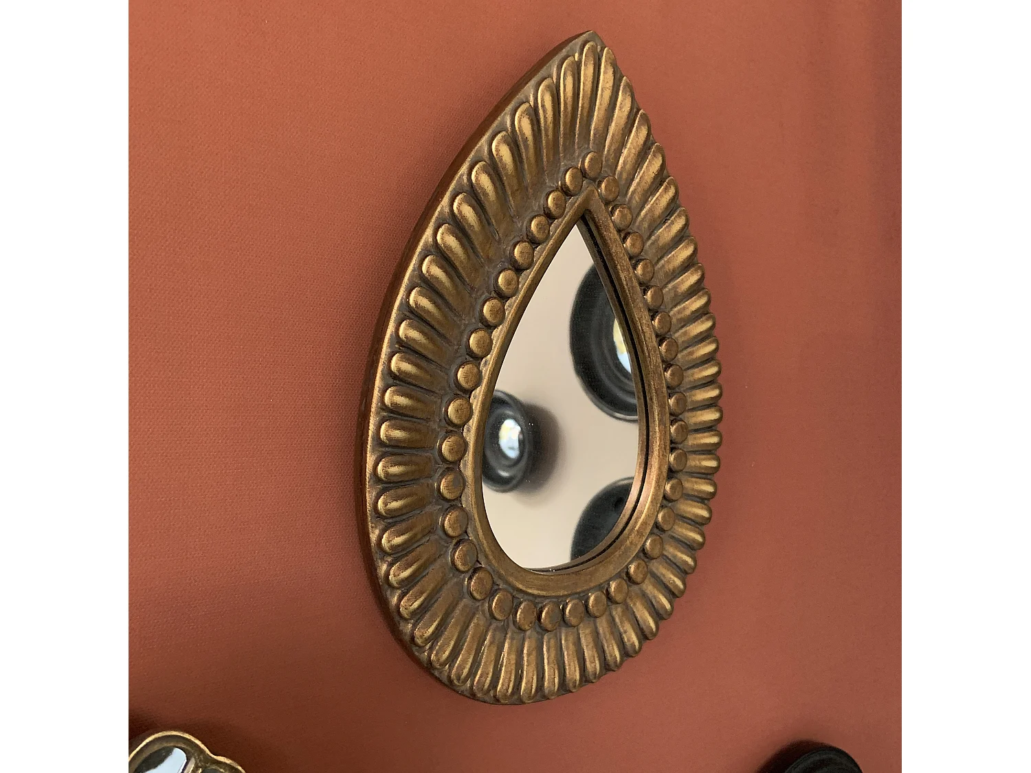 Miroir goutte doré motifs 19,7x27cm