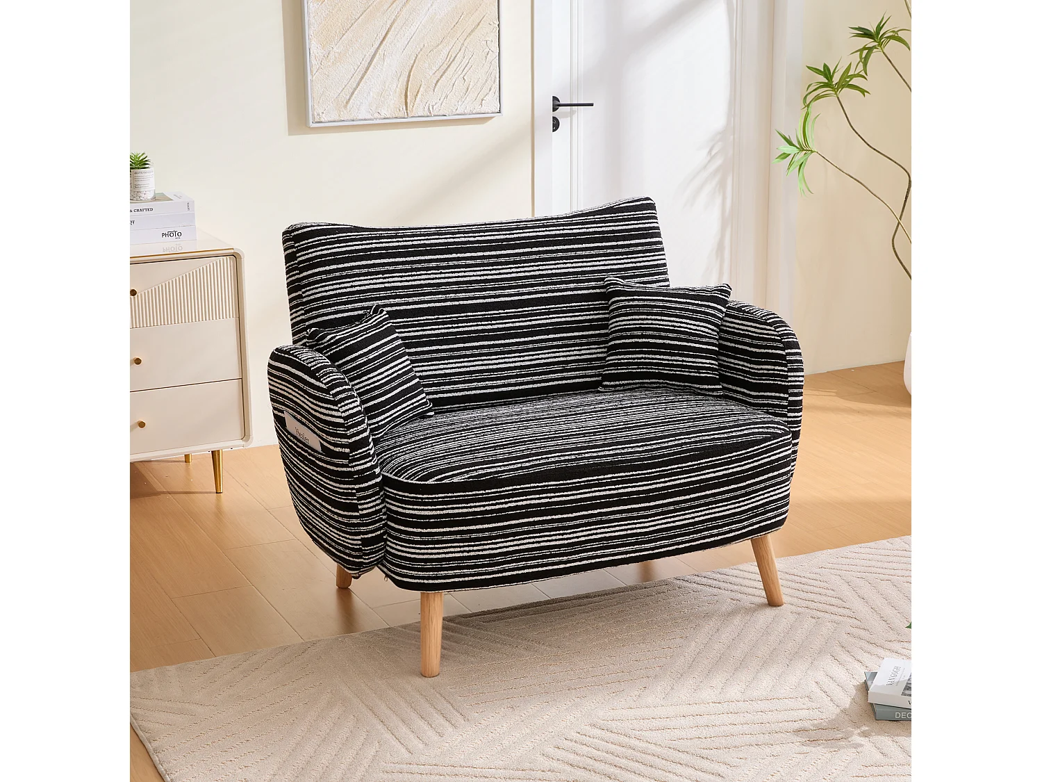 Sofá de dos plazas en tejido bouclé negro - Con bolsillos laterales y dos cojines