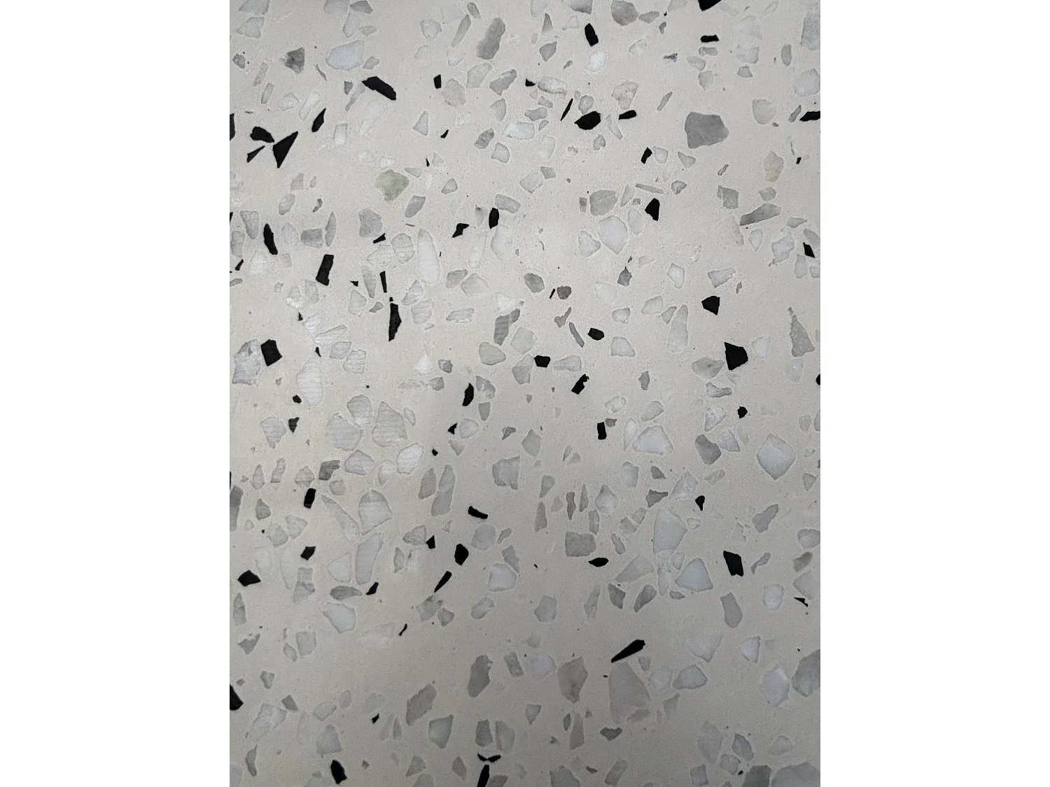 Table ronde de jardin en acier et plateau terrazzo