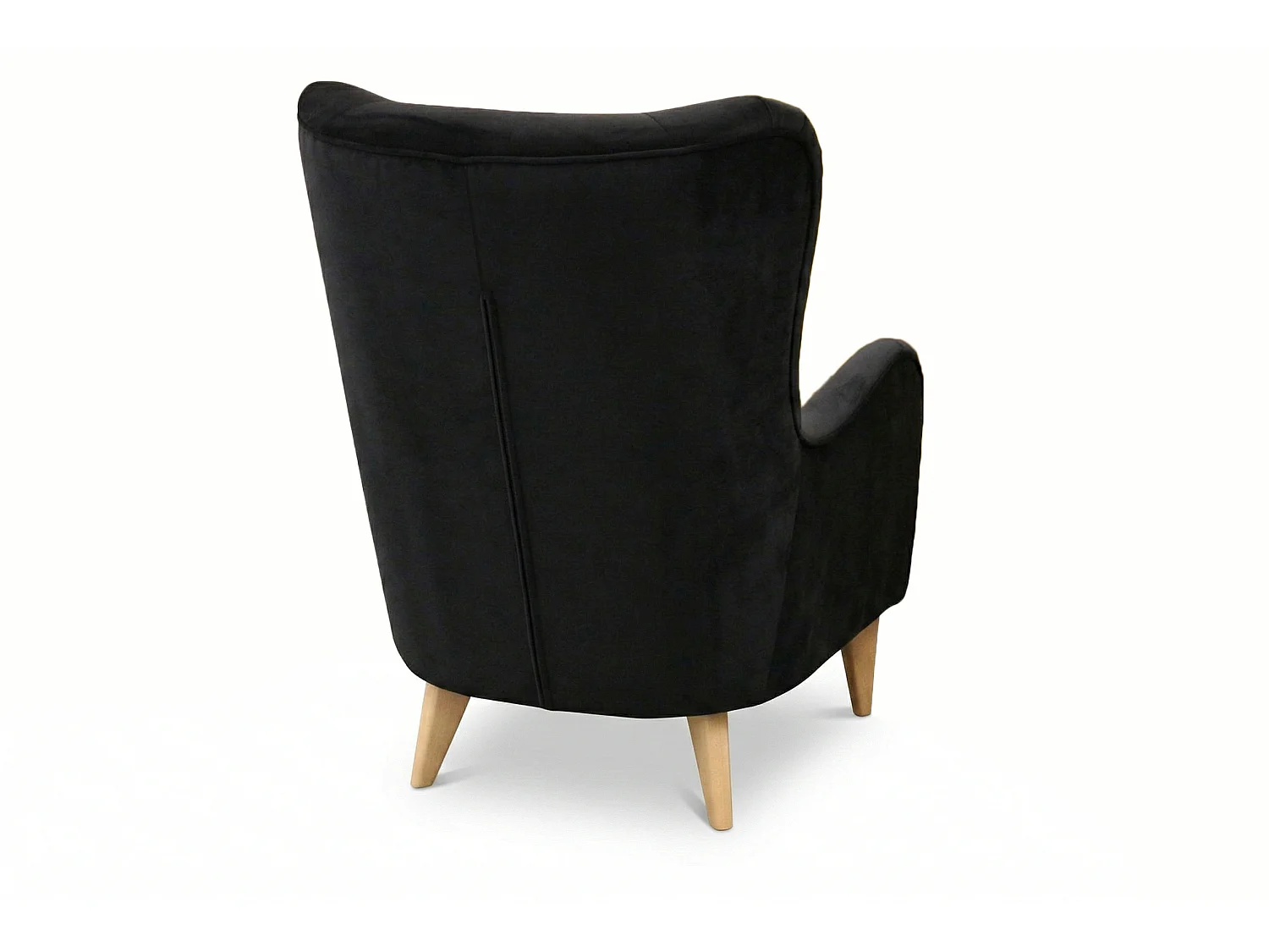 Élégant fauteuil de détente avec assise et dossier profilés.