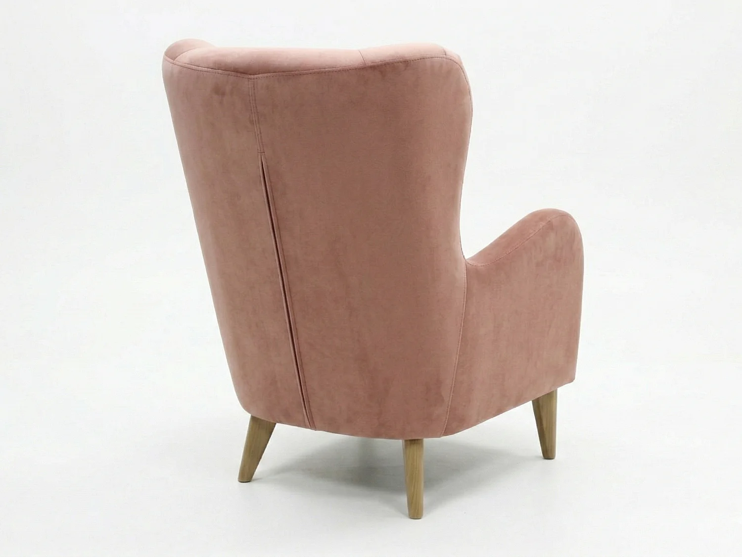 Élégant fauteuil de détente avec assise et dossier profilés.