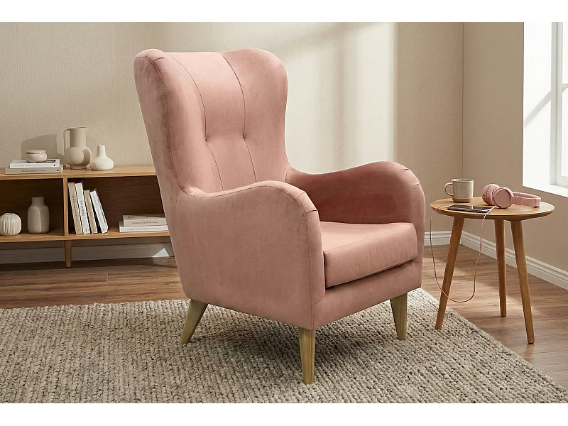 Élégant fauteuil de détente avec assise et dossier profilés.