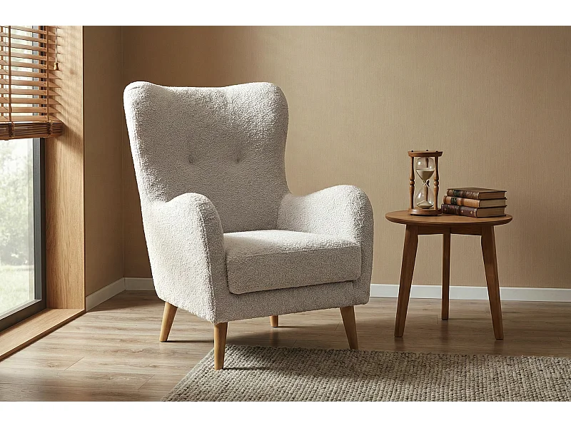Elegante relaxfauteuil Roland met gevormde zitting en rugleuning.