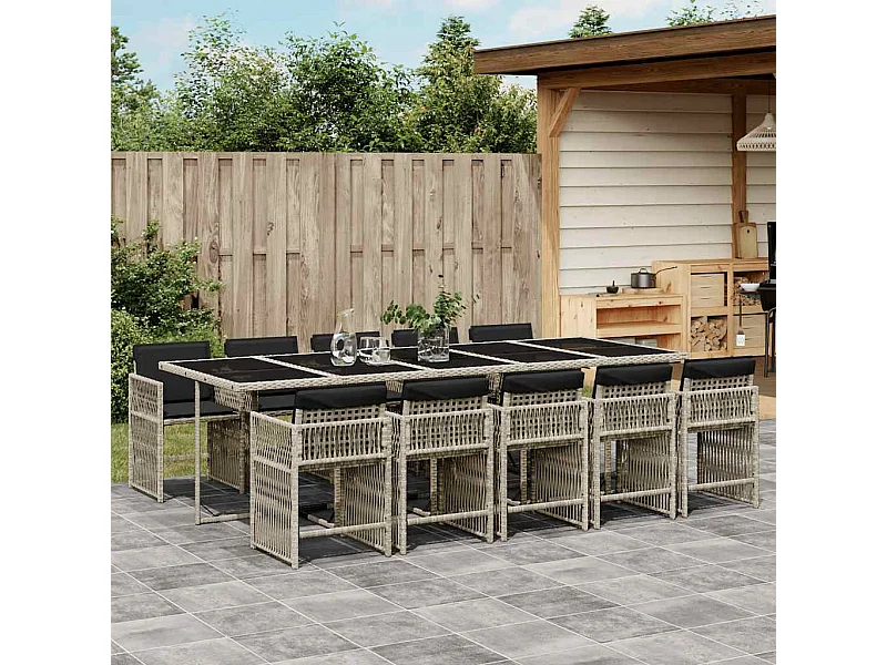 Set de comedor de jardín 11 piezas y cojines ratán sintético gris