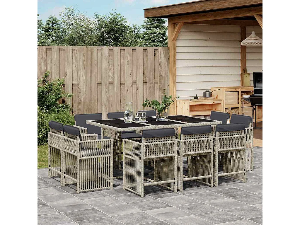 Set de comedor de jardín 11 piezas y cojines ratán sintético gris