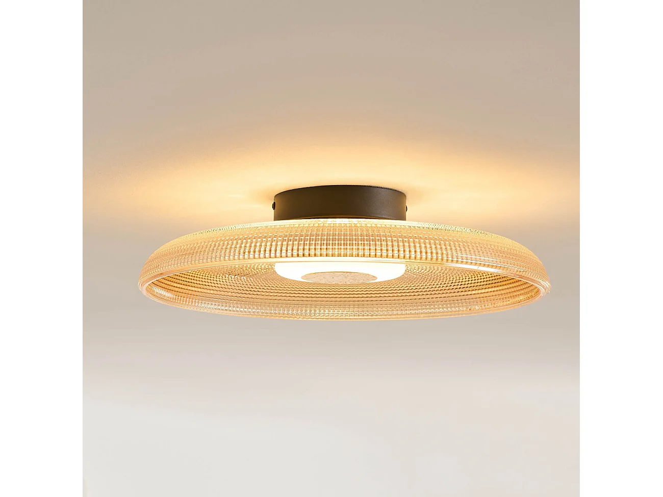 Plafonnier ou applique LED rond moderne verre ambré texturé et base noire - Ossara