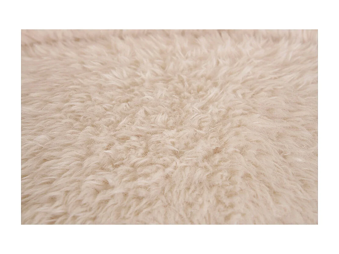 Fauteuil tissu texturé doux crème ANDY – Douceur ronde et design compact