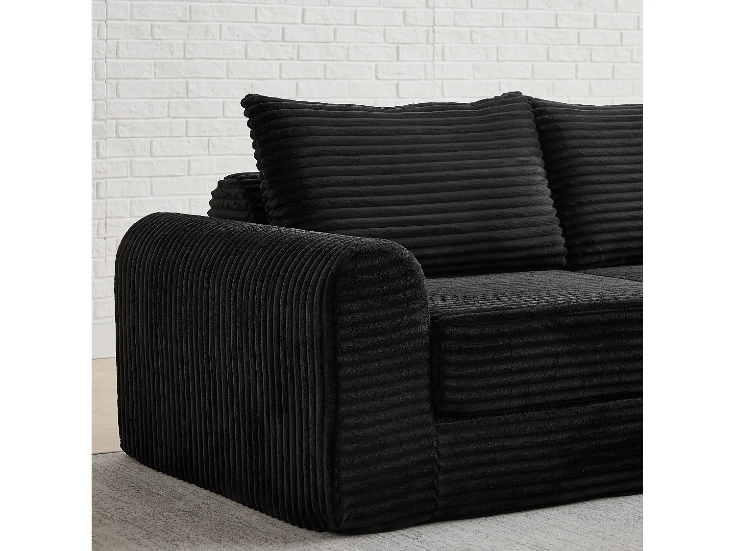 Canapé convertible 2 places en velours côtelé avec poufs - Accoudoirs incurvés - Noir