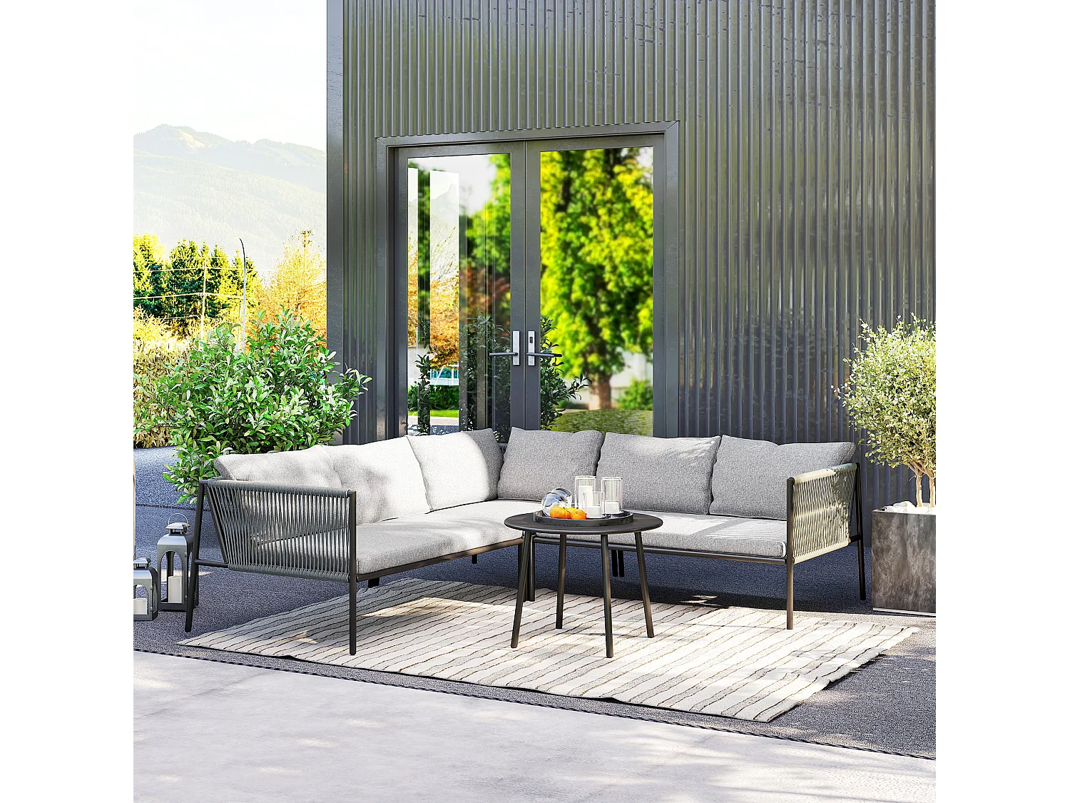 Salotto da giardino con divano angolare modulabile e tavolino rattan