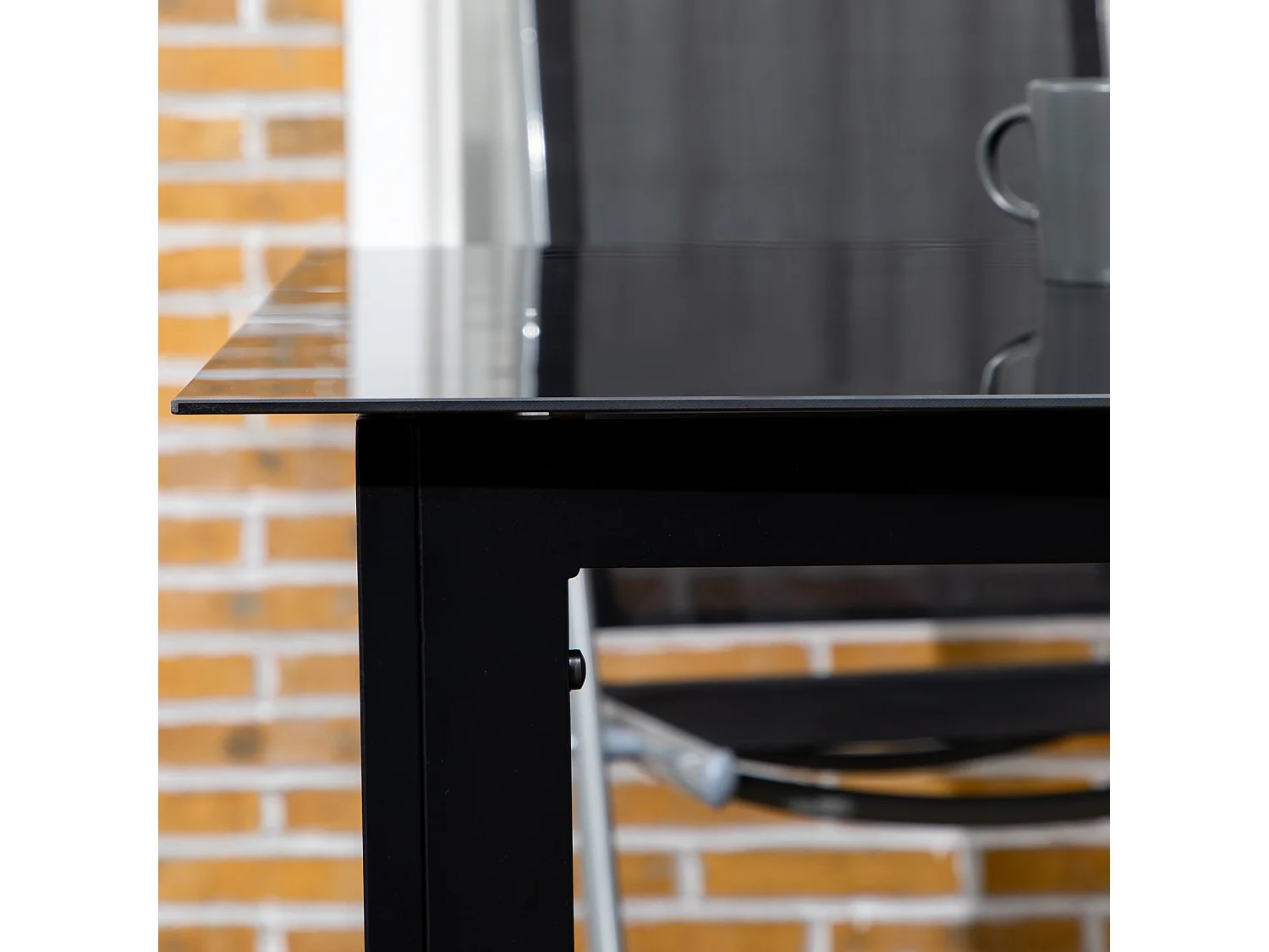 Tavolo da giardino per 6 persone in vetro e alluminio nero