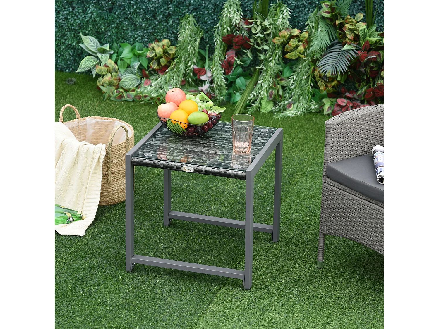 Tavolino da caffè da giardino in rattan con piano in vetro temperato