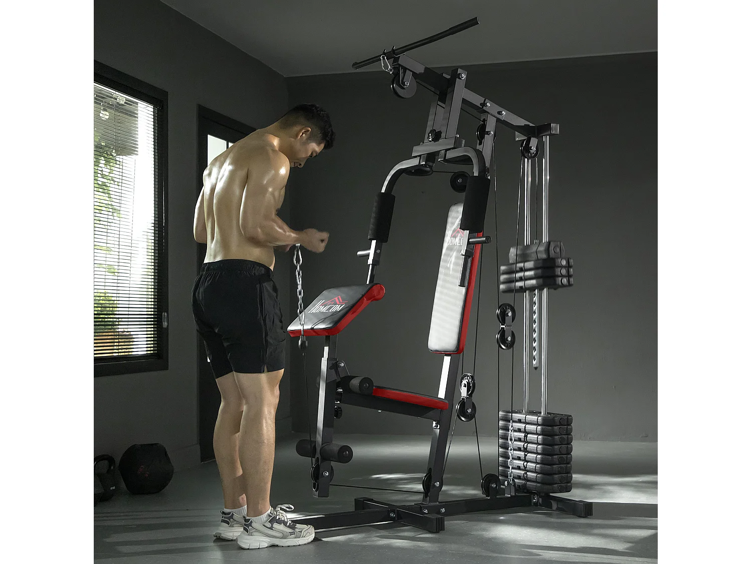 Power tower con pesi da 65kg in acciaio nero rosso