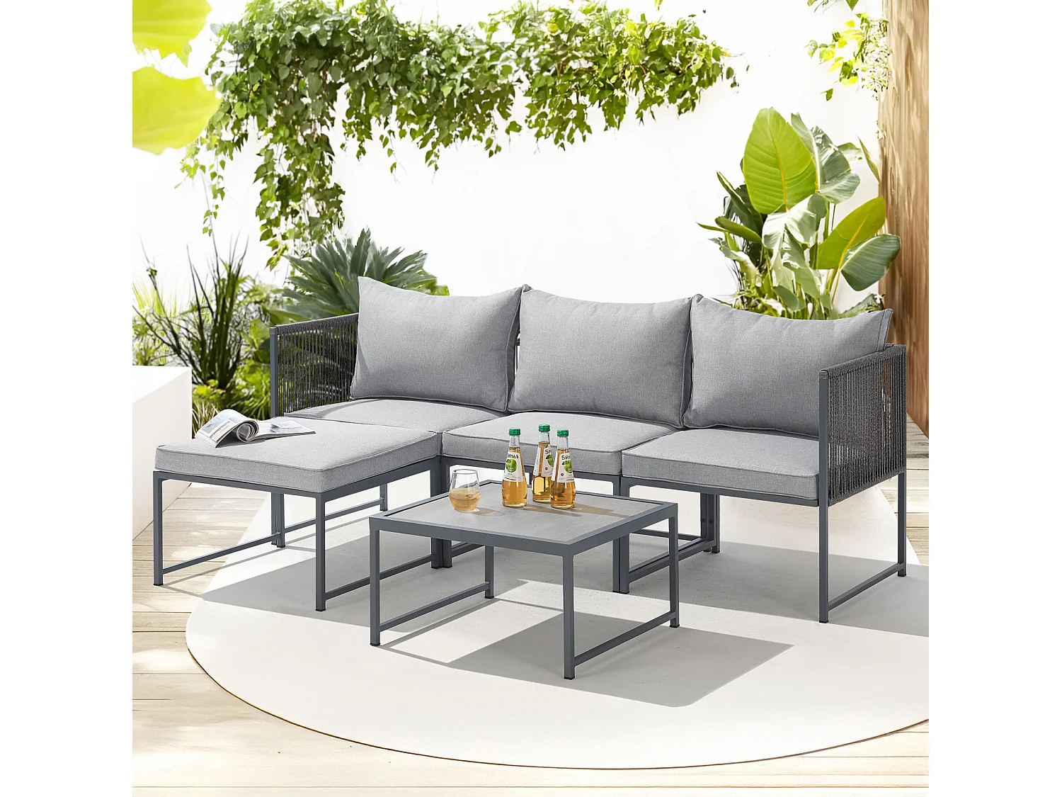 Salon de jardin en résine tressée Canapé d'angle modulable Table Coussins inclus Gris