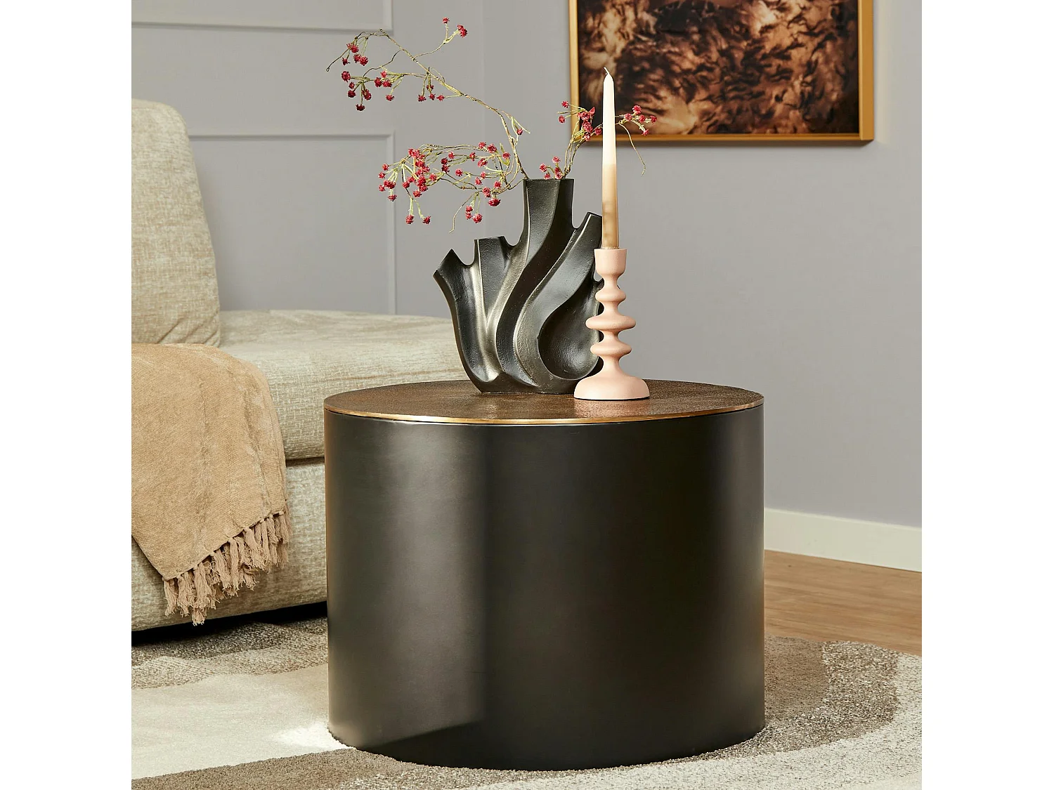 Petite table ronde noire à plateau doré effet vieilli KANO