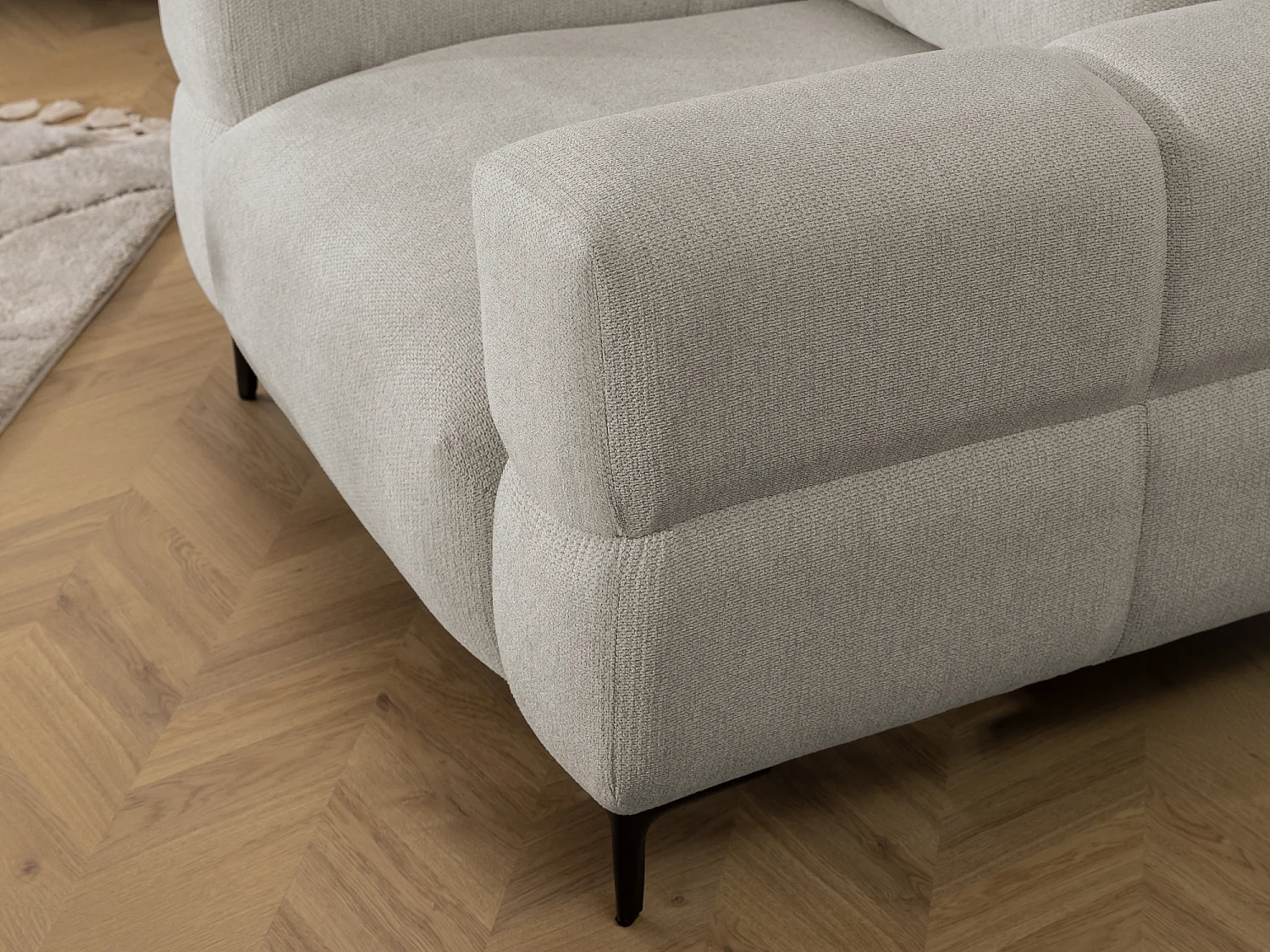 Fauteuil au design bubble en tissu texturé doux de couleur taupe, offrant un grand confort d’assise CARDEA