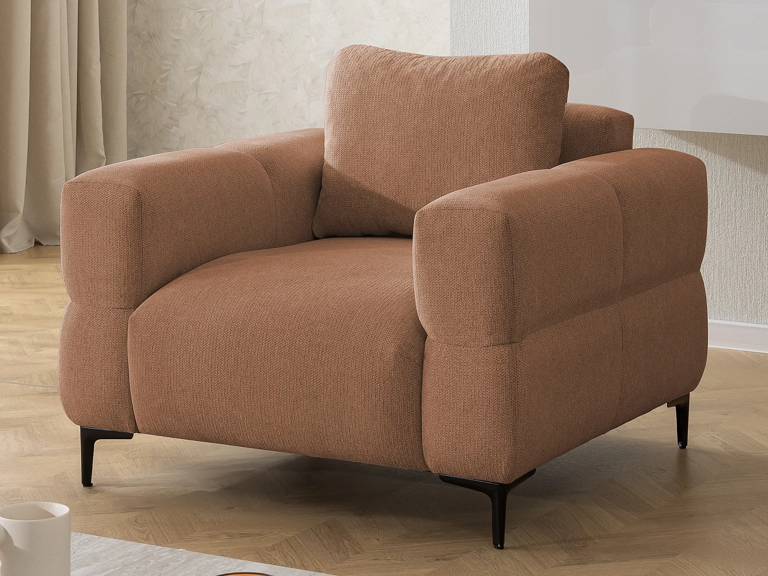 Fauteuil au design bubble en tissu texturé doux de couleur terre cuite, offrant un grand confort d’assise CARDEA