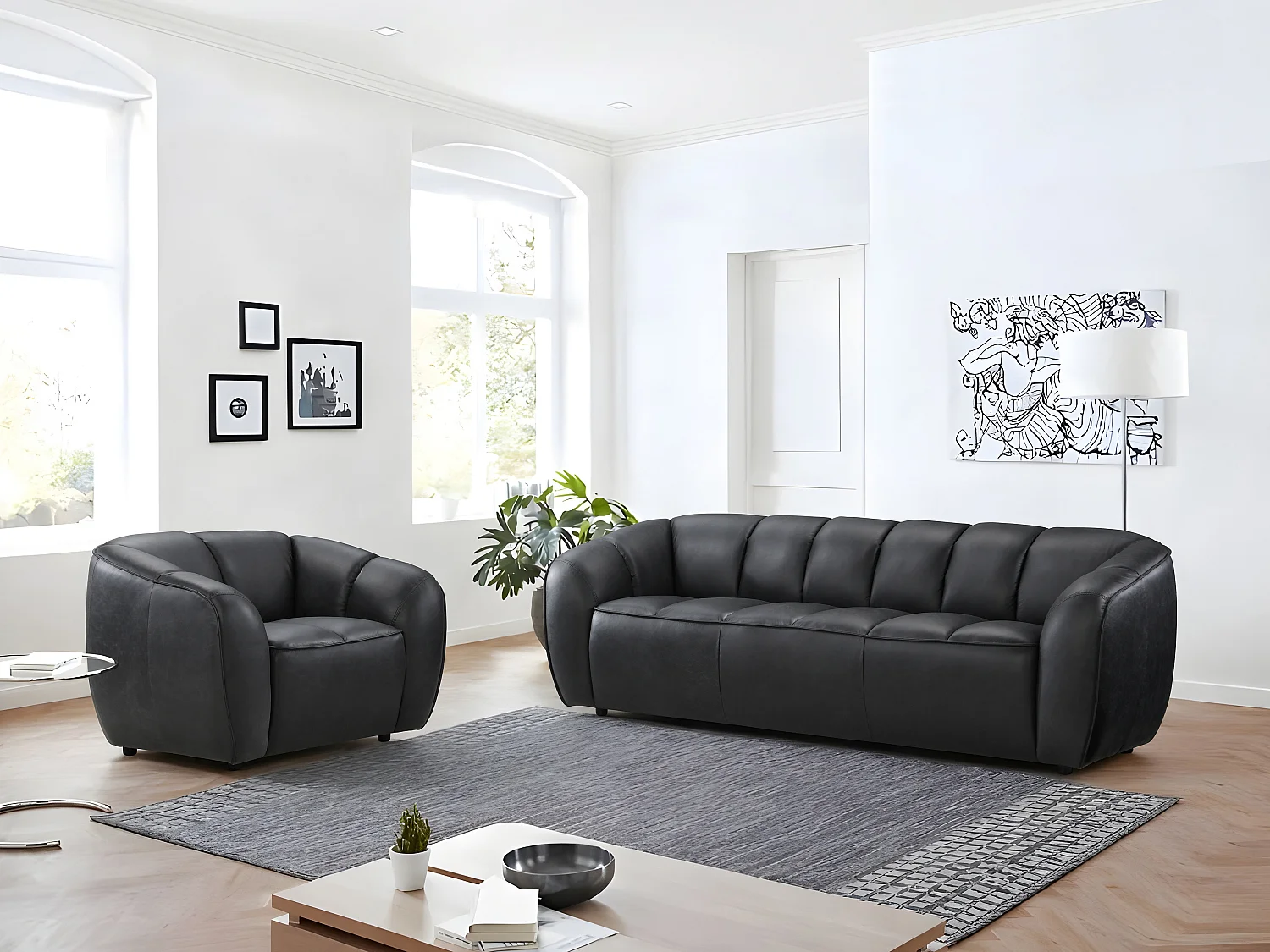 Canapé 3 places et un fauteuil en cuir noir PRADONI