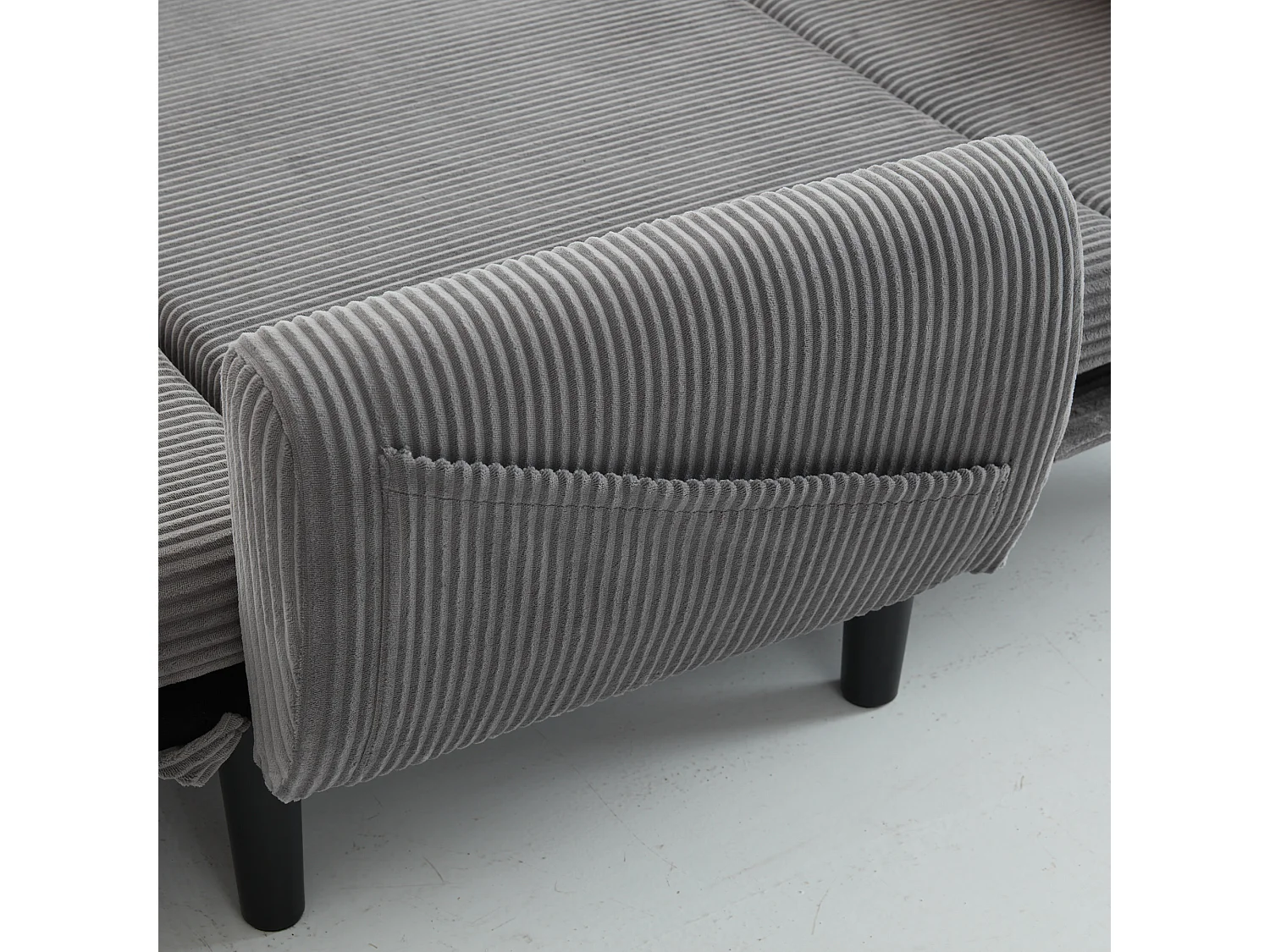 Canapé convertible 2 places en velours côtelé gris avec 2 coussins ronds