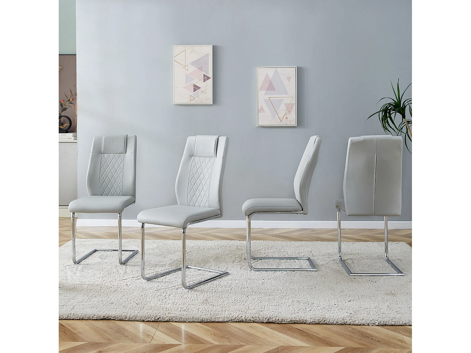 Lot de 4 chaises en simili cuir PU gris clair - Pieds métal argenté antidérapants