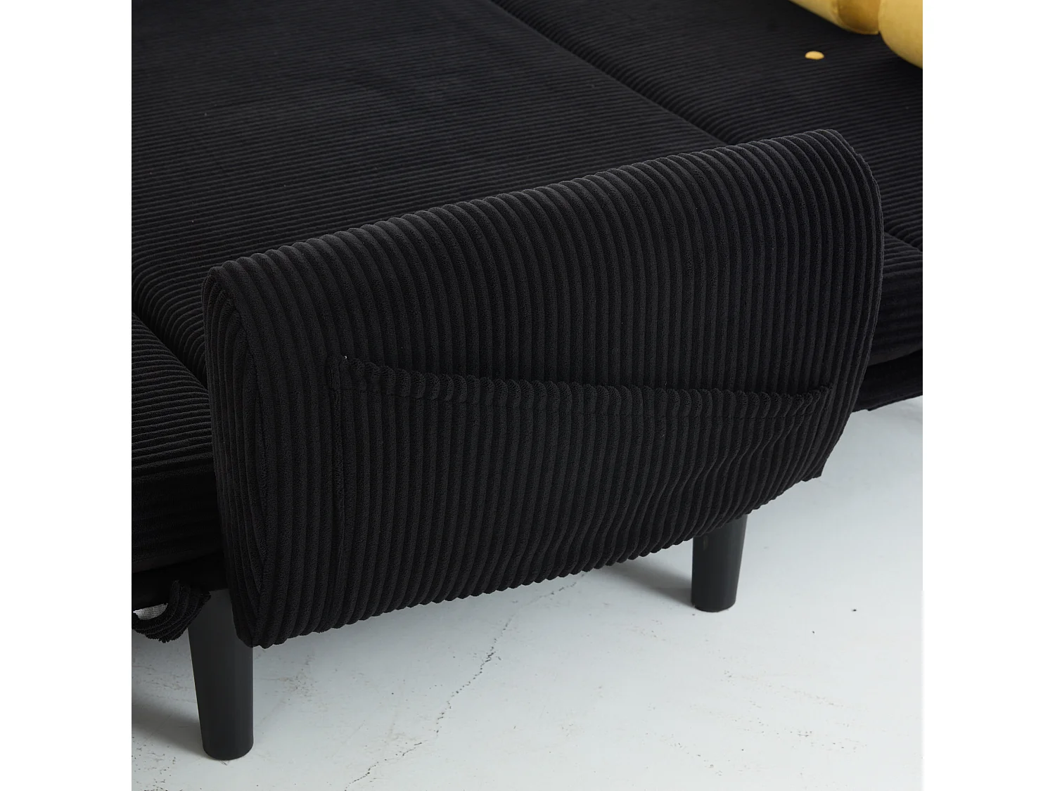 Canapé convertible 2 places en velours côtelé noir avec 2 coussins ronds