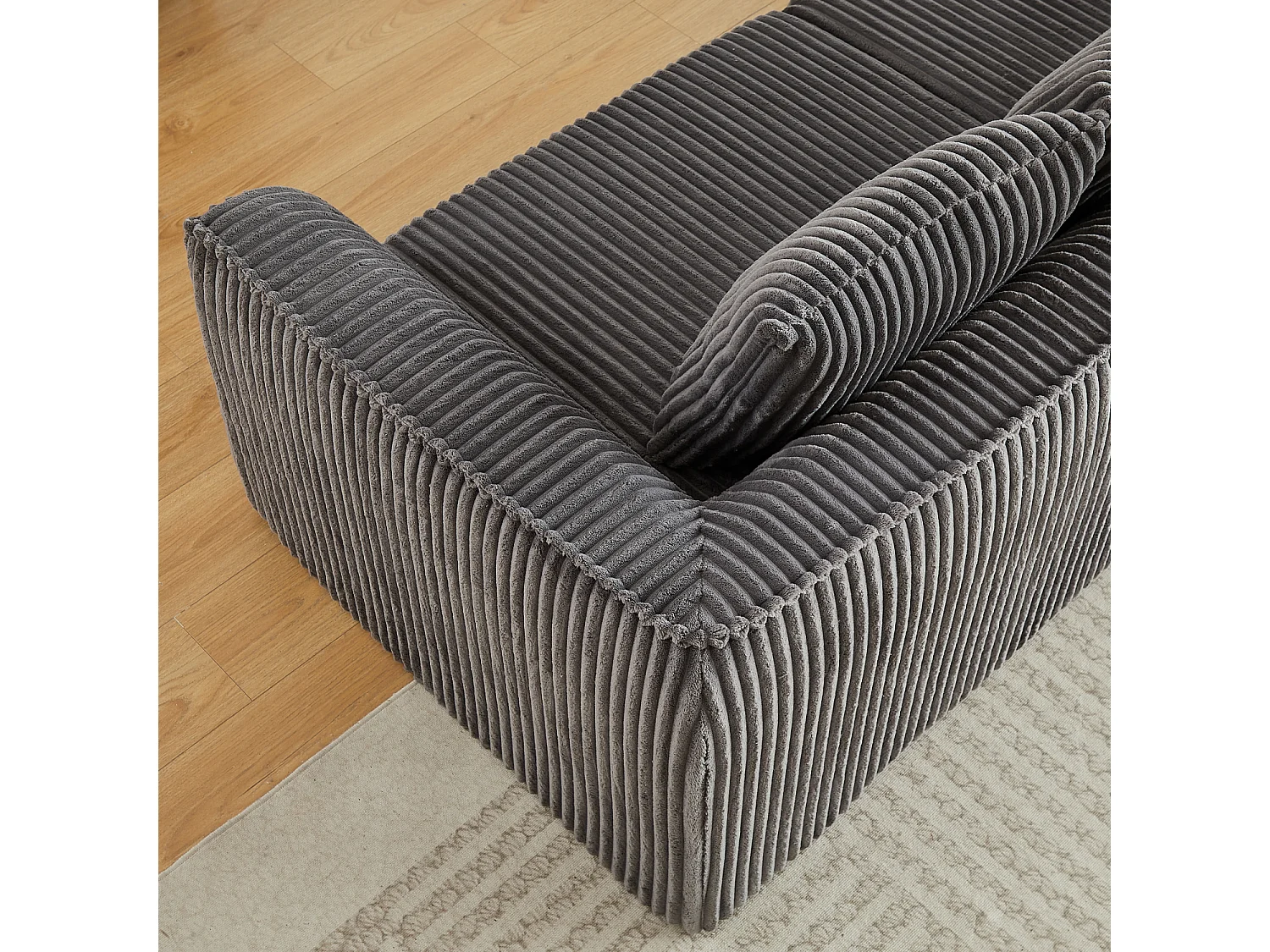 Canapé modulable 2 places en tissu velours côtelé gris avec 2 coussins