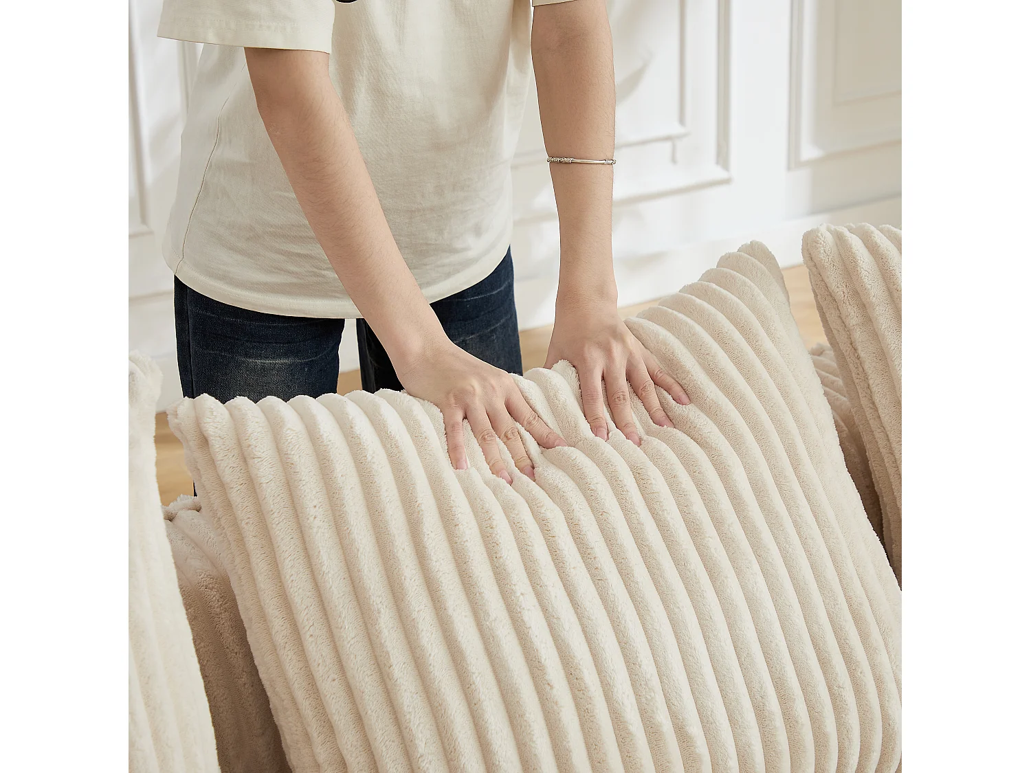 Canapé modulable 2 places en tissu velours côtelé beige avec 2 coussins