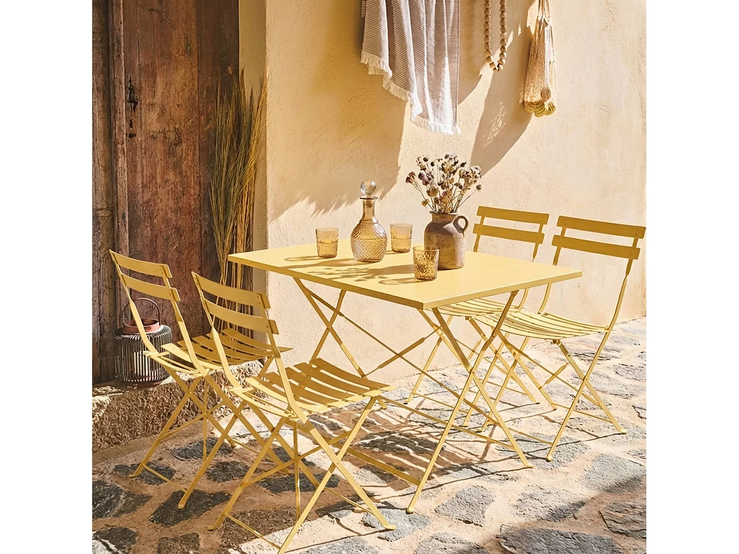 Table de jardin bistrot pliante métal + 4 assises 110 x 70cm. avec quatre chaises pliantes. acier thermolaqué