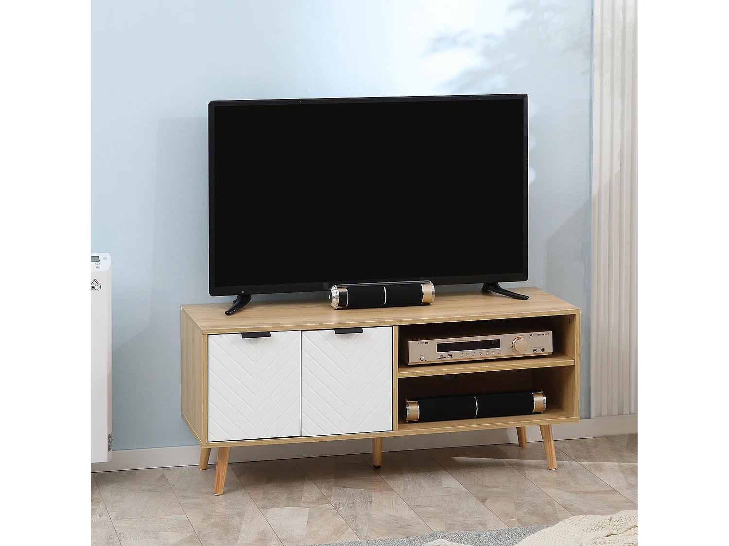 Meuble TV pour télévision jusqu'à 46 pouces design scandinave 2 portes 2 niches avec passe-câbles 110 x 39 x 48,8 cm