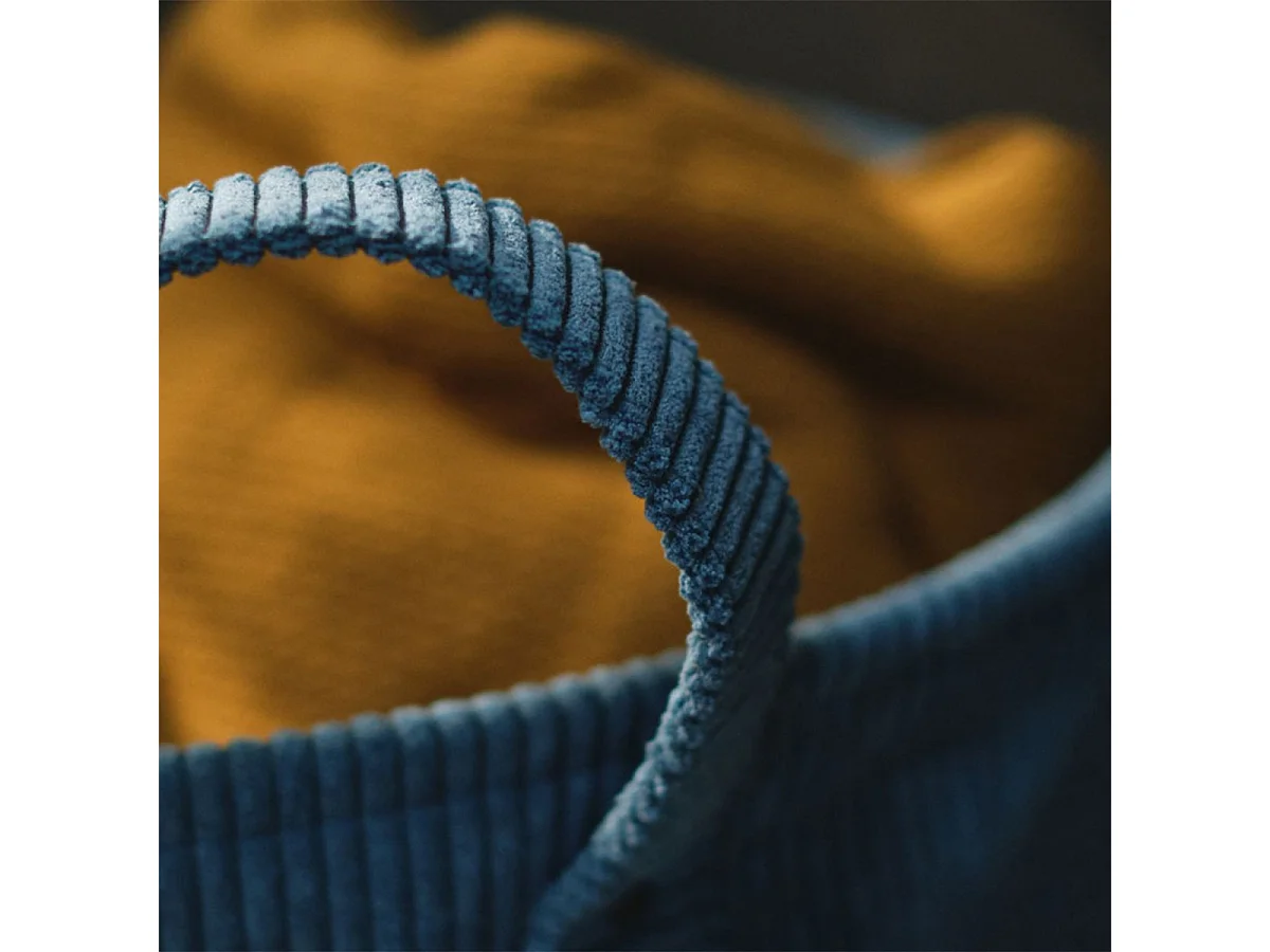 Corbeille à linge cosy en velours côtelé