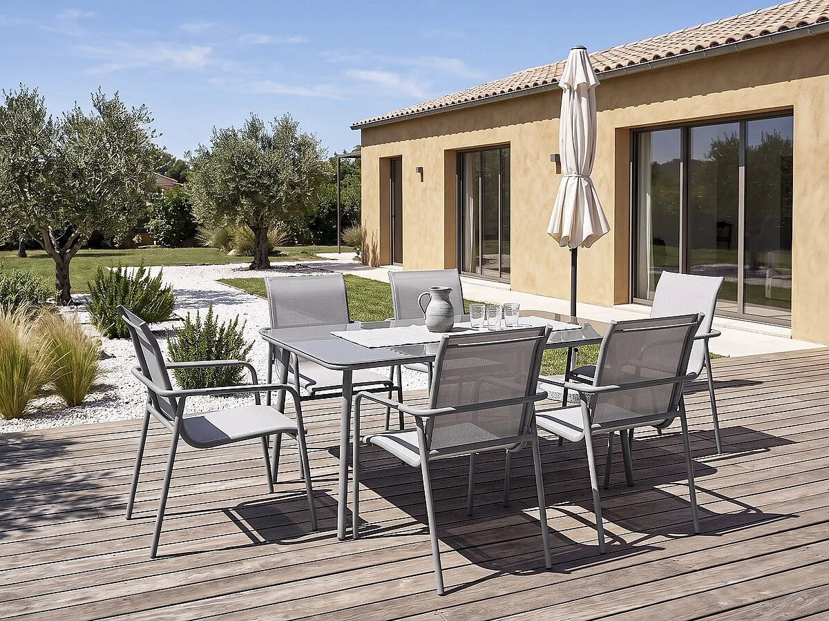 "Malaga" Metalen Tuinset - 7 Stoelen - Grijs, Glazen Tafelblad, Stapelbare Stoelen