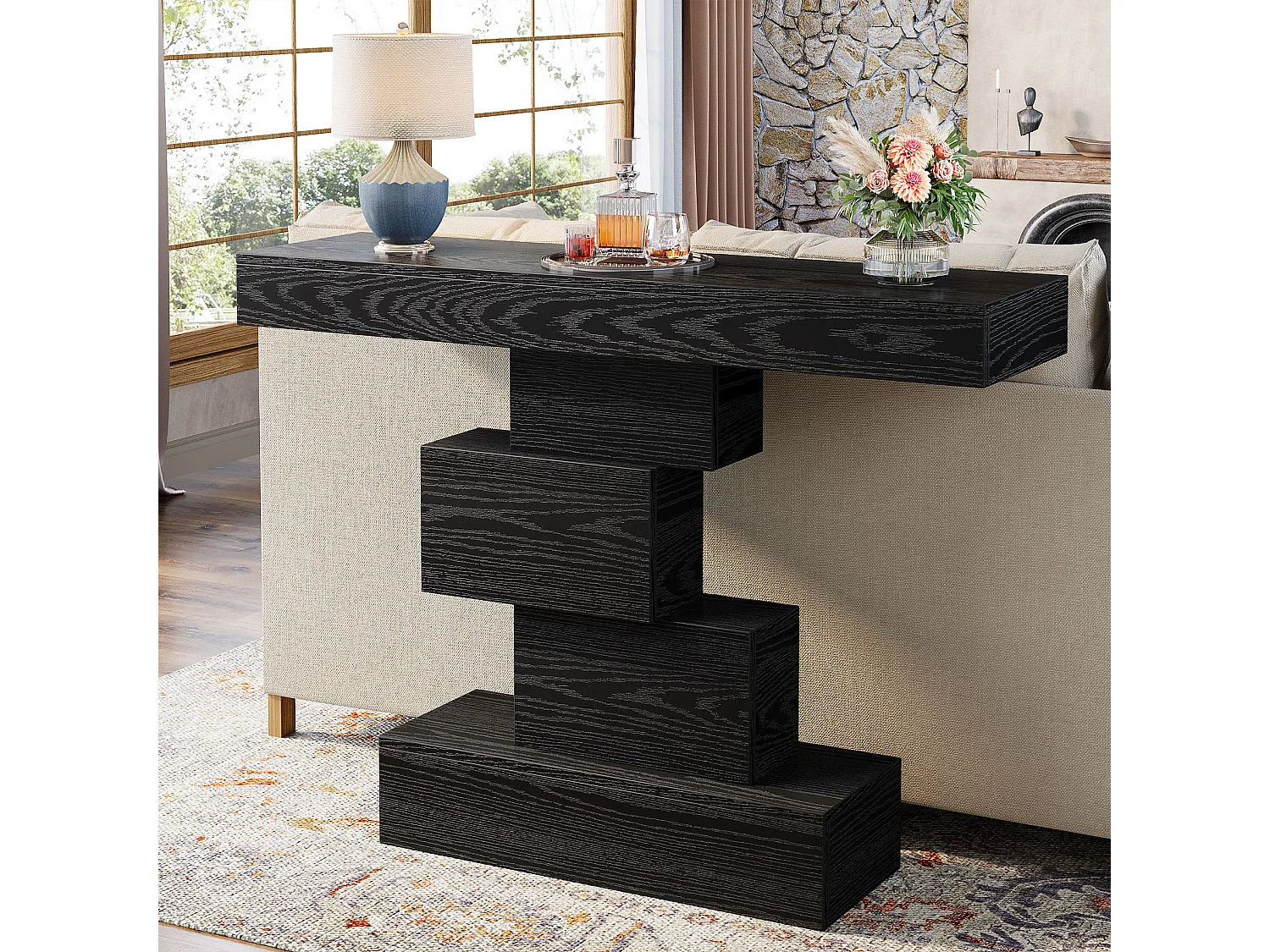 Console noire de 108 cm, table d'appoint étroite en bois avec piètement géométrique, à placer derrière un canapé.