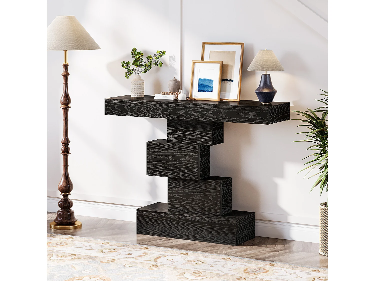 Console noire de 108 cm, table d'appoint étroite en bois avec piètement géométrique, à placer derrière un canapé.