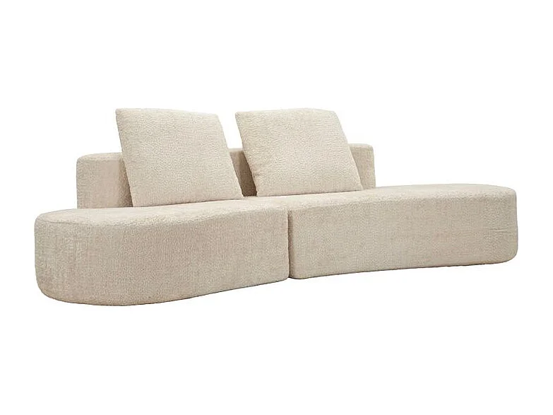 Sofá moderno de diseño escultural en color blanco.