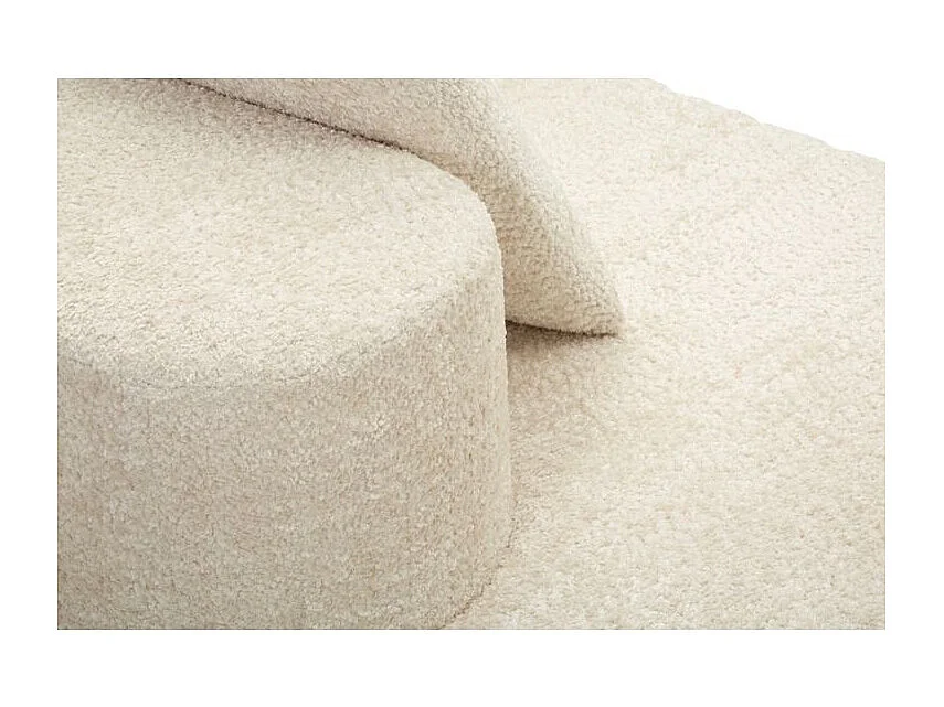 Sofá moderno de diseño escultural en color blanco.