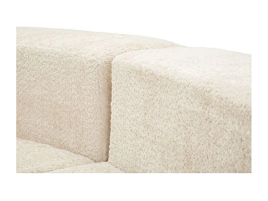 Sofá moderno de diseño escultural en color blanco.