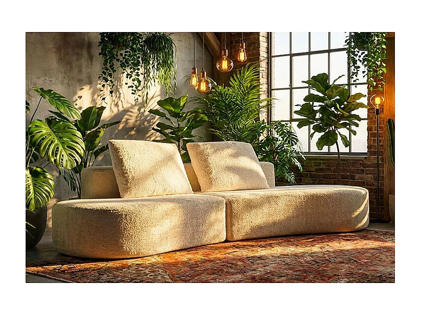 Sofá moderno de diseño escultural en color blanco.