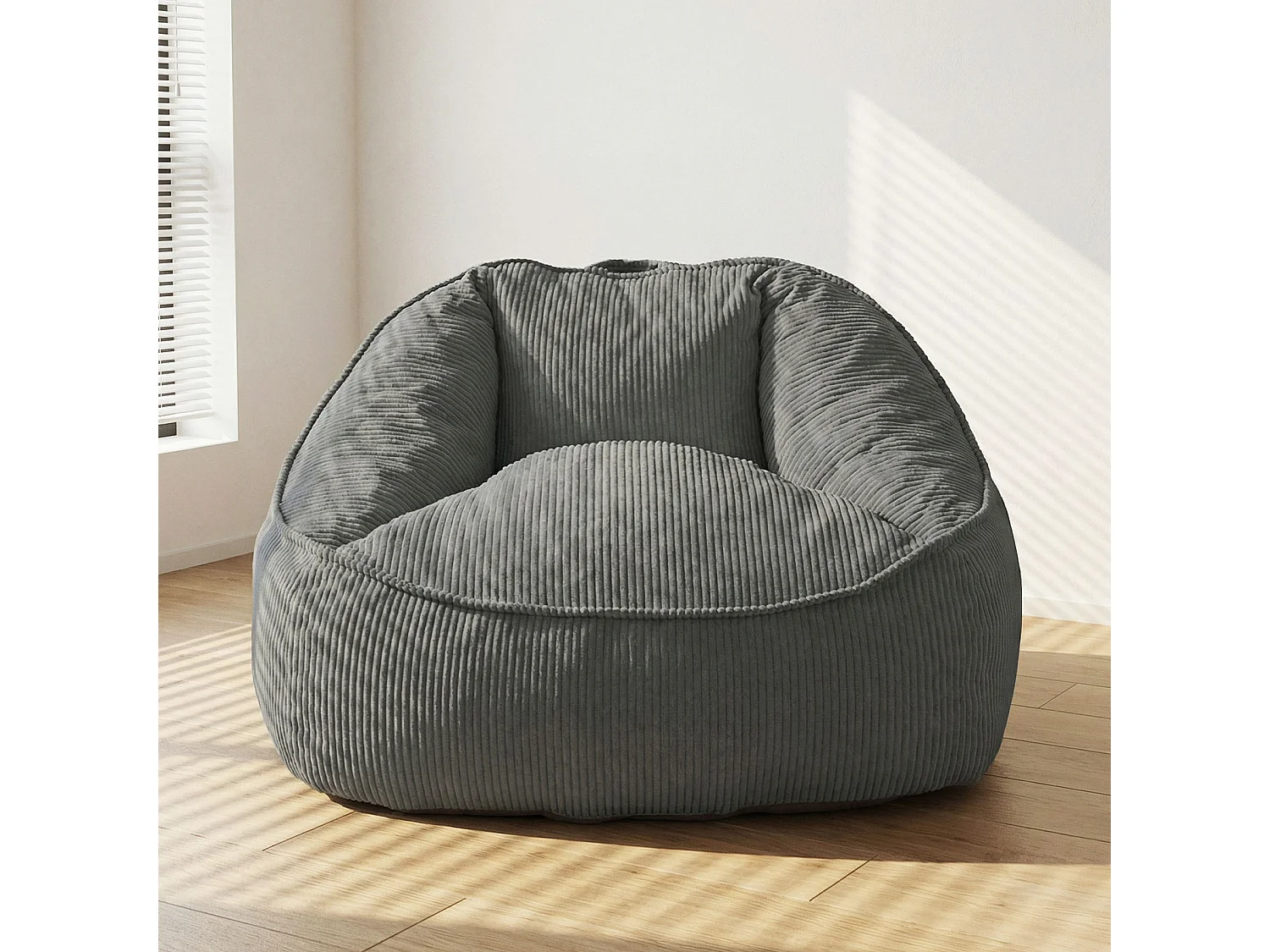 Pouf poire en velours côtelé, effet cocon et base antidérapante pour chambre et salon