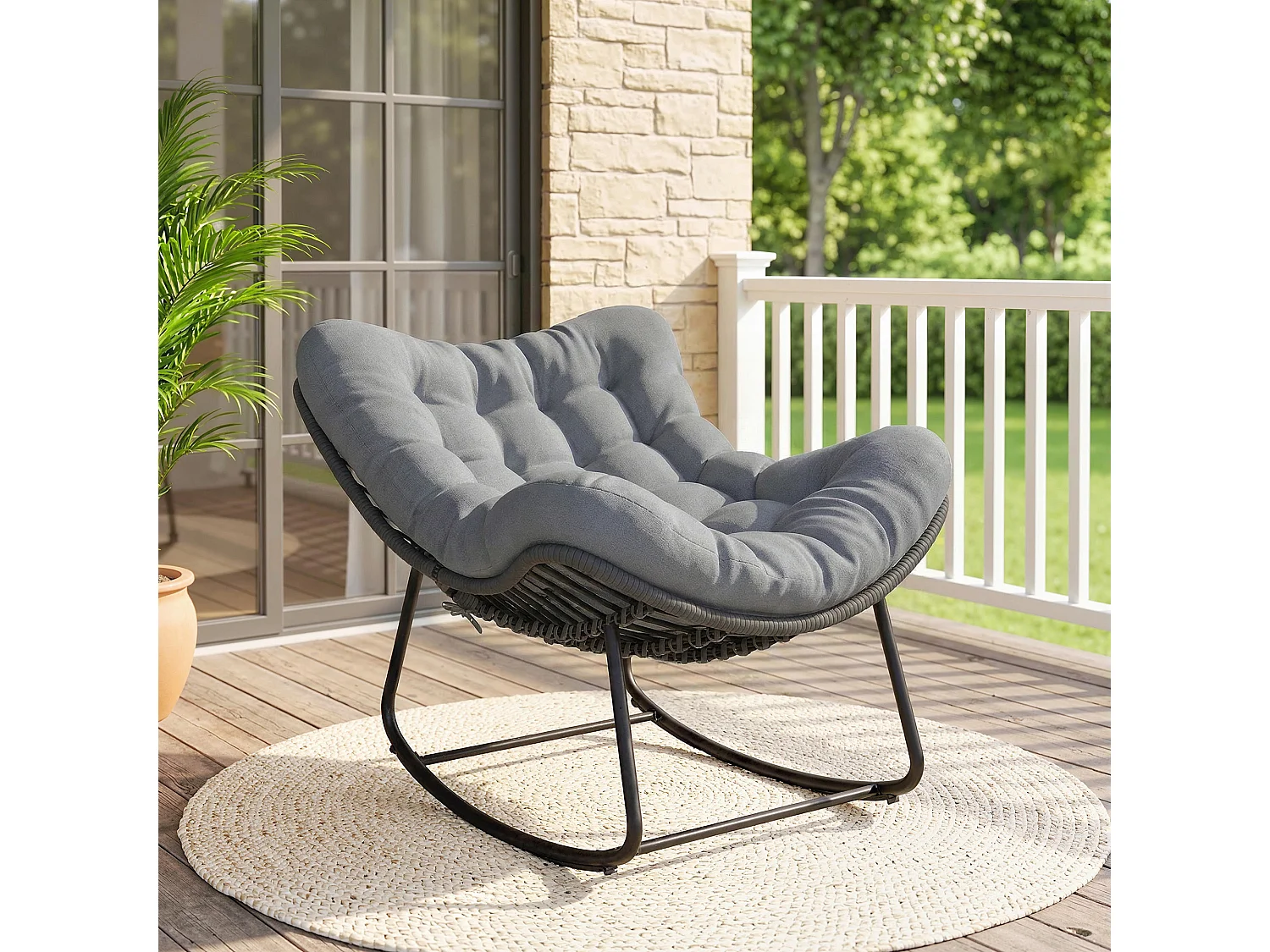 Sedia a dondolo con cuscino in rattan grigio scuro