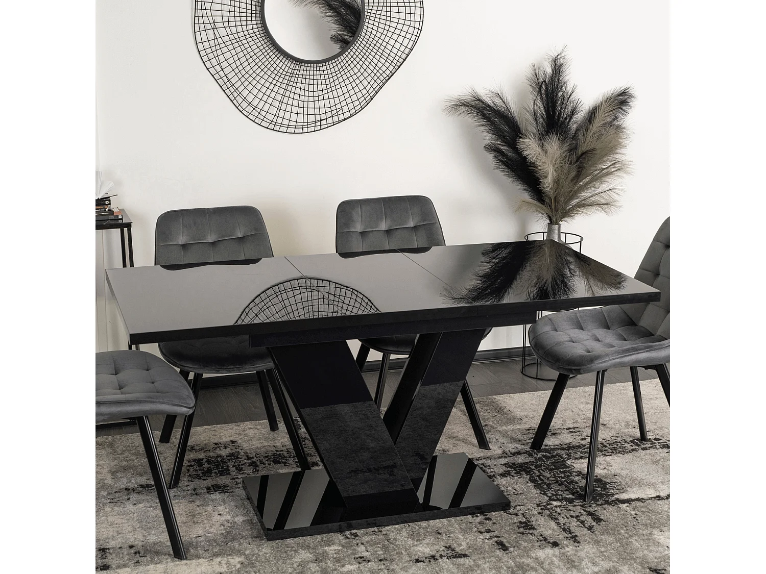 Table extensible CLARK de dimensions 120-160 cm en noir brillant