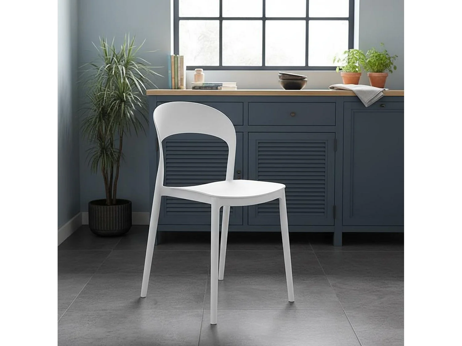 Pack 4 sillas de plástico blancas – ligeras, resistentes y modernas para cocina, comedor o terraza