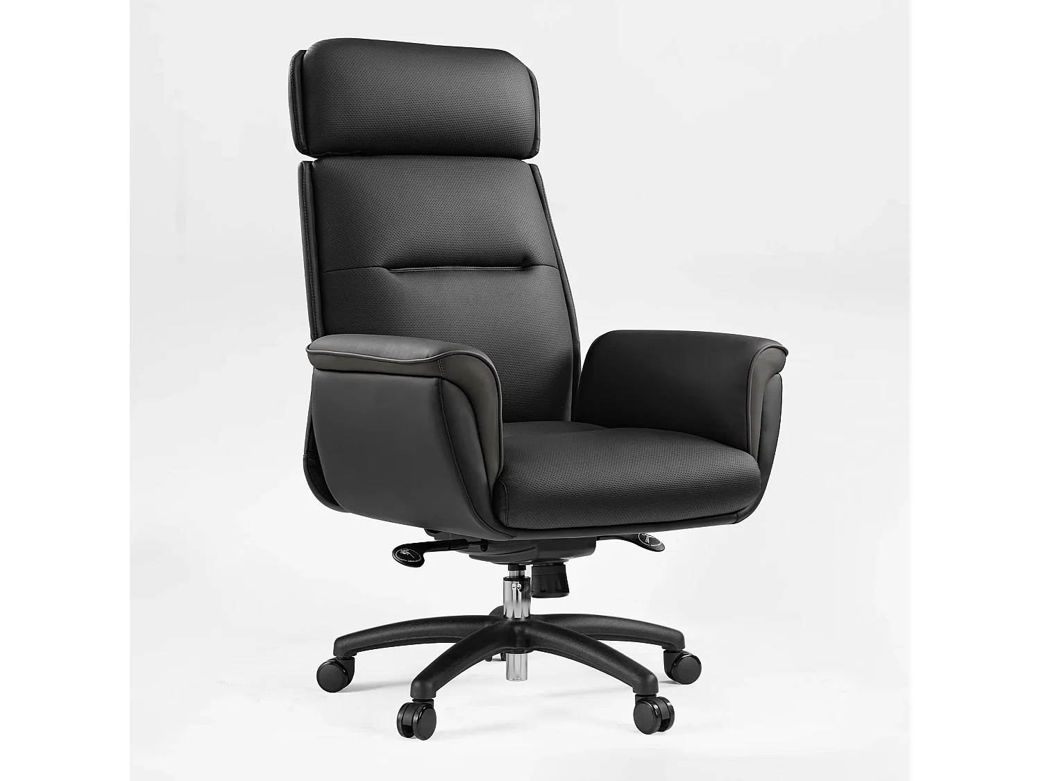 Fauteuil bureau cuir microfibre ergonomique, modèle direction confortable haut et spacieux. Pourvu d'appui-tête surélevé et garnissage bien rembourré, adapté