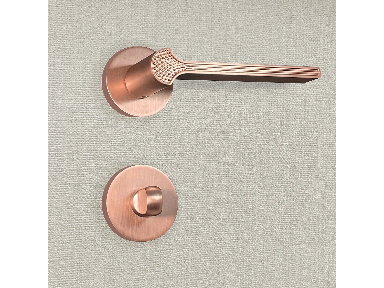 Poignée de porte design à condamnation finition aspect or rose Cristina - KATCHMEE - KatchMee