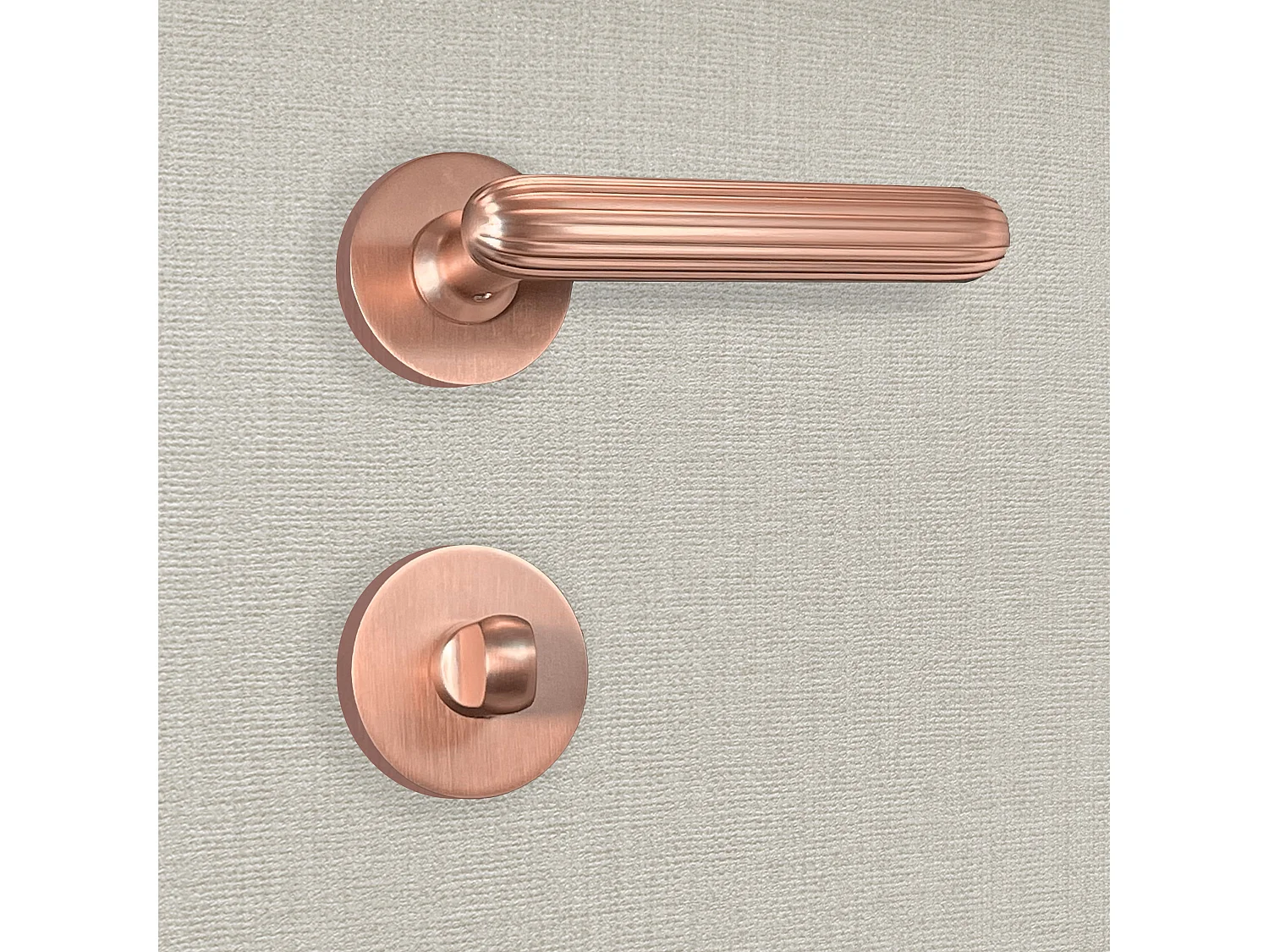 Poignée de porte design à condamnation finition aspect or rose Livia - KATCHMEE - KatchMee