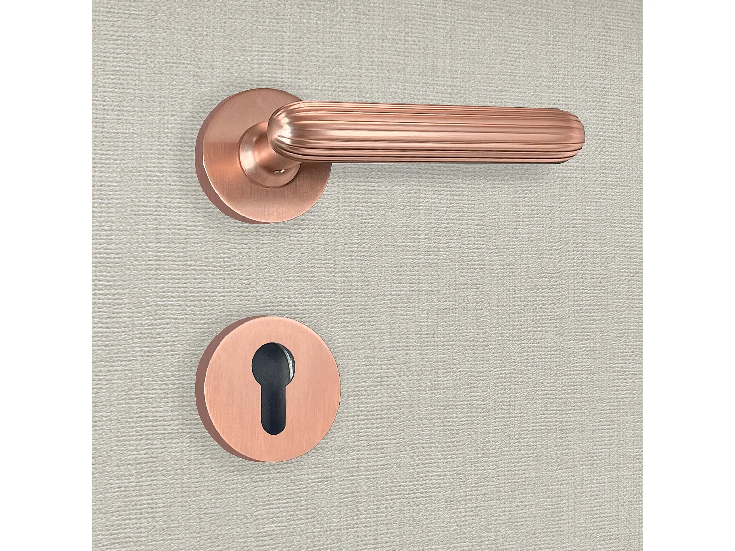 Poignée de porte design à cylindre finition aspect or rose Livia - KATCHMEE - KatchMee