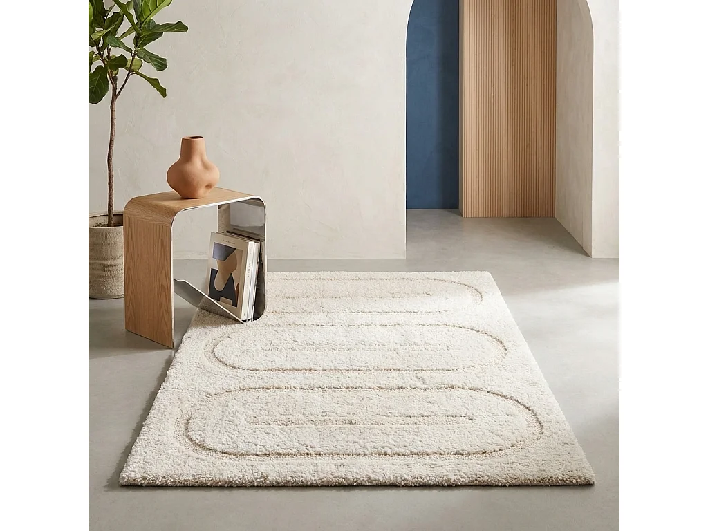 Alfombra interior con motivos geométricos crema