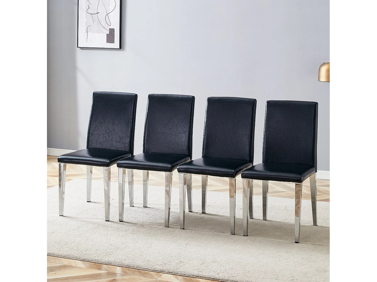 Set van 4 eetkamerstoelen in zwart kunstleer met zilverkleurige metalen poten
