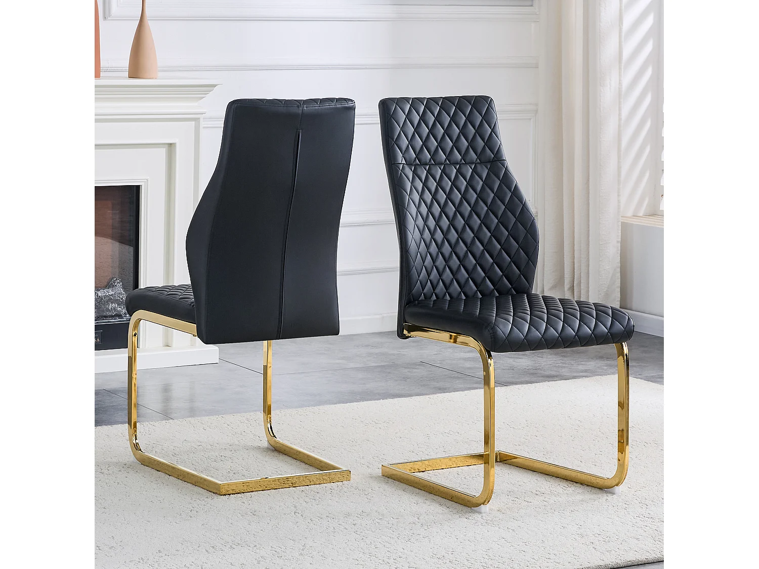Set van 2 eetkamerstoelen met hoge rugleuning, bekleed met zwart kunstleer en voorzien van goudkleurige metalen poten