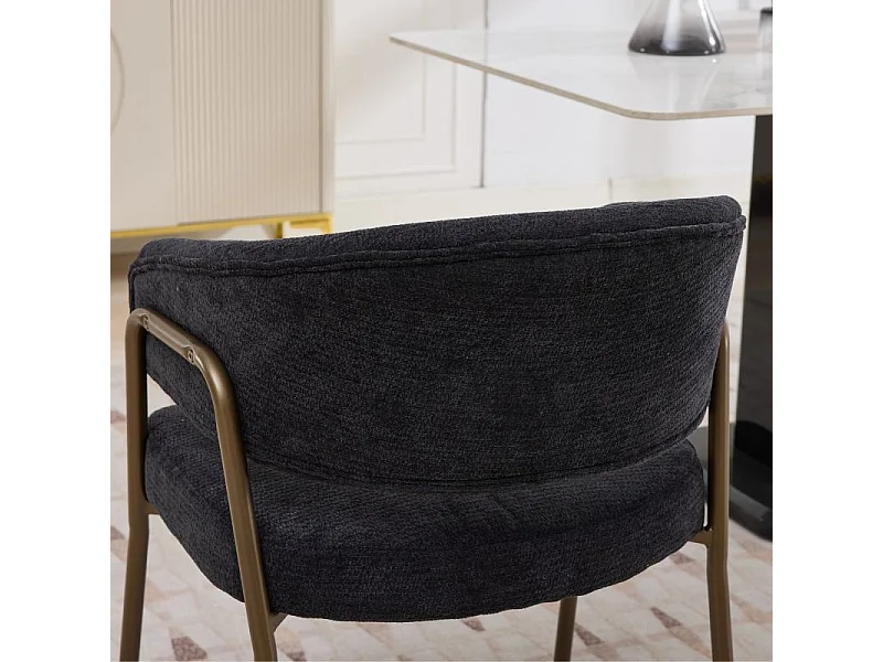 Chaise de salle à manger en chenille noir avec accoudoirs et pieds en métal finition laiton vieilli